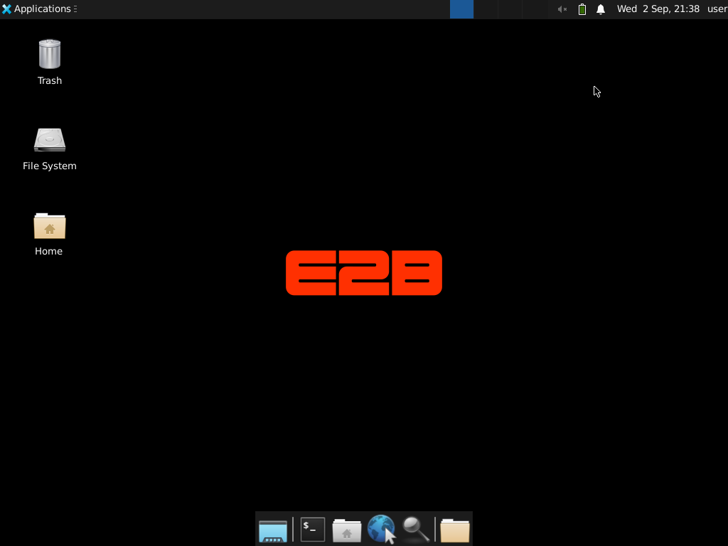 E2B Desktop Sandbox showing its Linux desktop, Applications menu, file-system and home icons, terminal launcher and browser launcher.